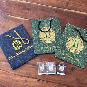 3 Disney Club 33 bags and 3 VIP pins